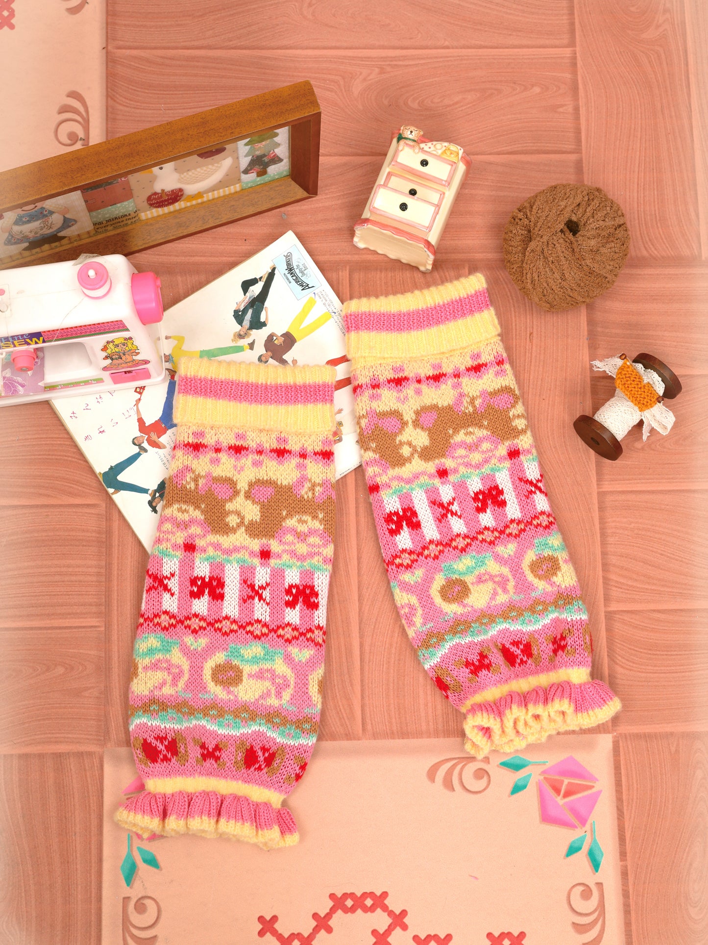 Yellowish-pink slimming knitted leg warmers/socks with wool for warmth and lace trim.