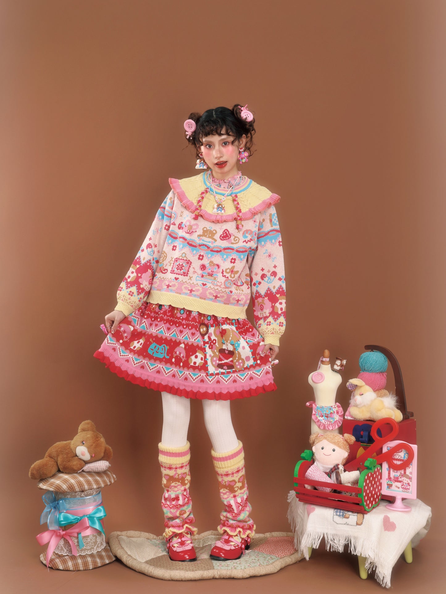 Cable knit sweater with a large lapel collar and contrasting pastel colors, a versatile and retro-style pullover.