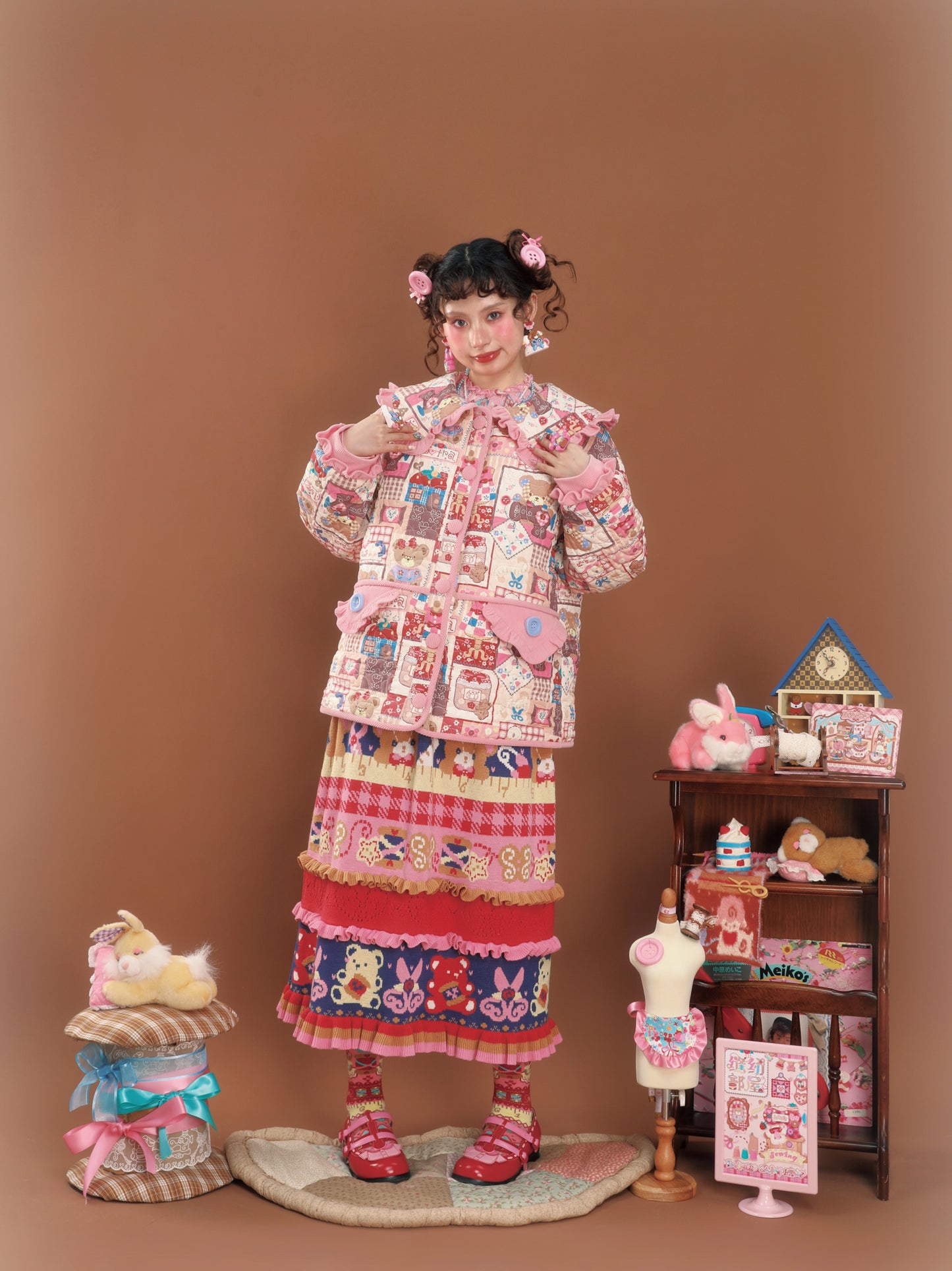 Pink patchwork-style printed loose-fitting warm quilted cotton jacket.