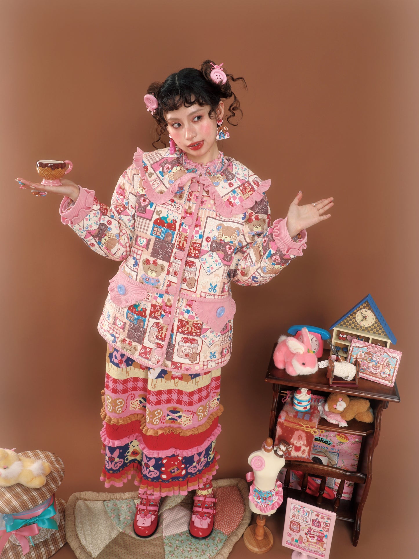 Pink patchwork-style printed loose-fitting warm quilted cotton jacket.