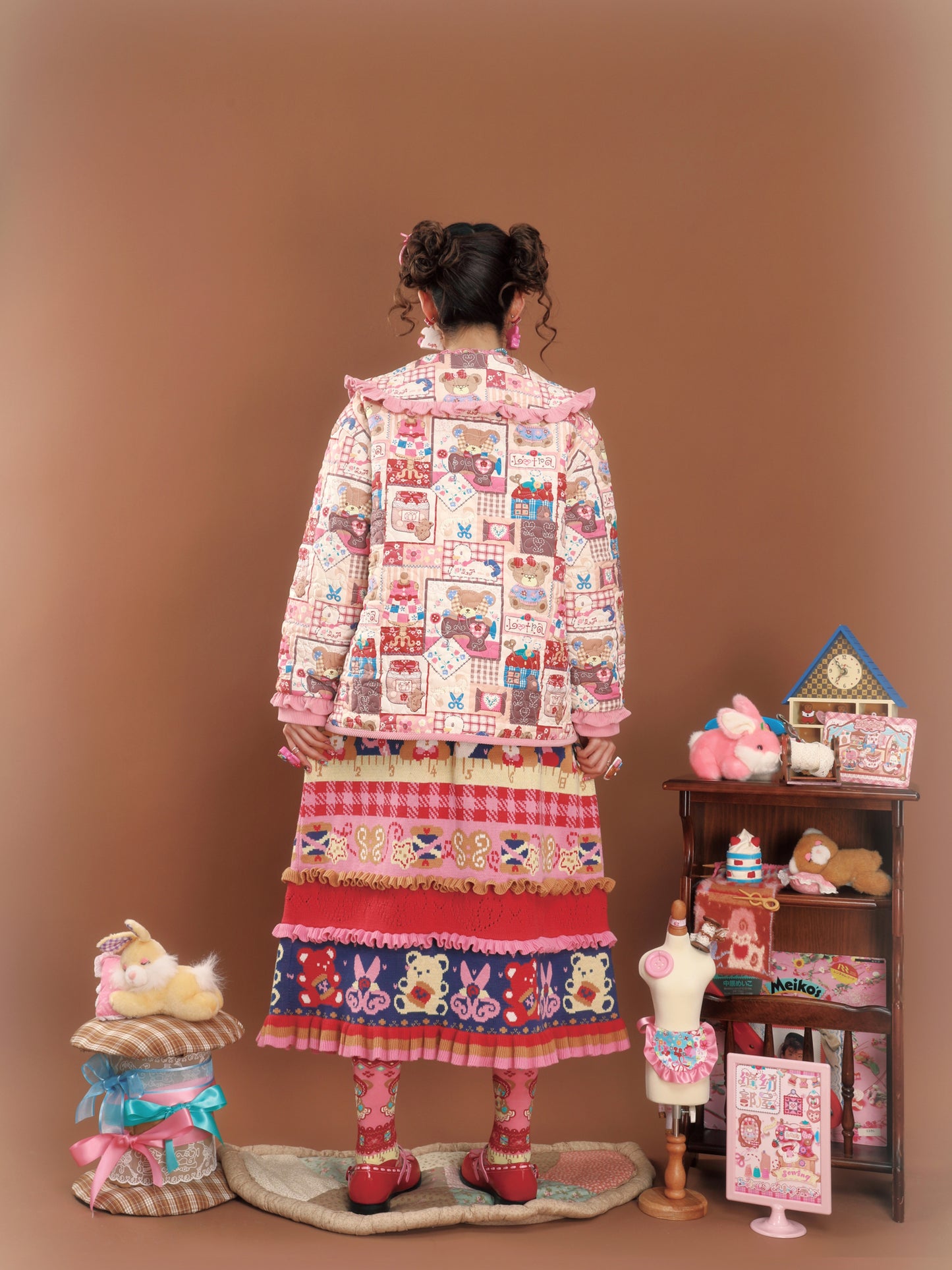 Pink patchwork-style printed loose-fitting warm quilted cotton jacket.