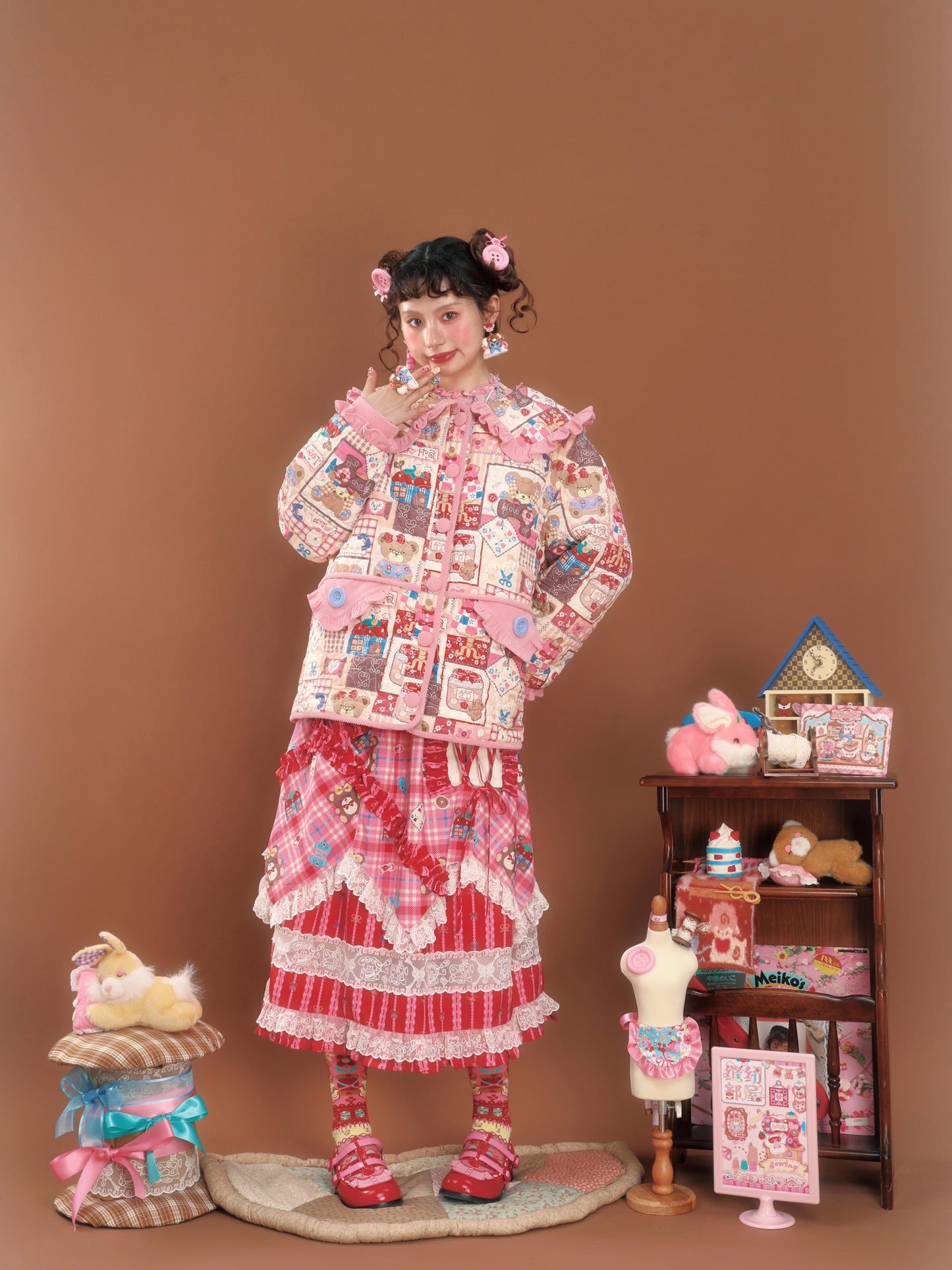 Pink patchwork-style printed loose-fitting warm quilted cotton jacket.