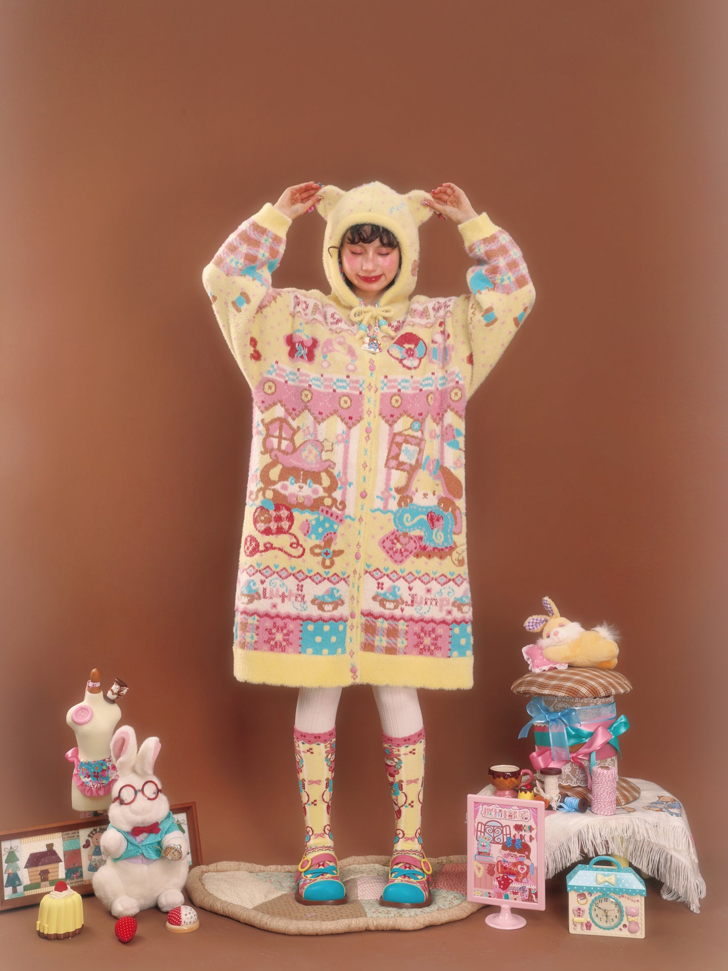 Yellow faux mink hooded cardigan with bear ears and rabbit design, long length, for warmth.