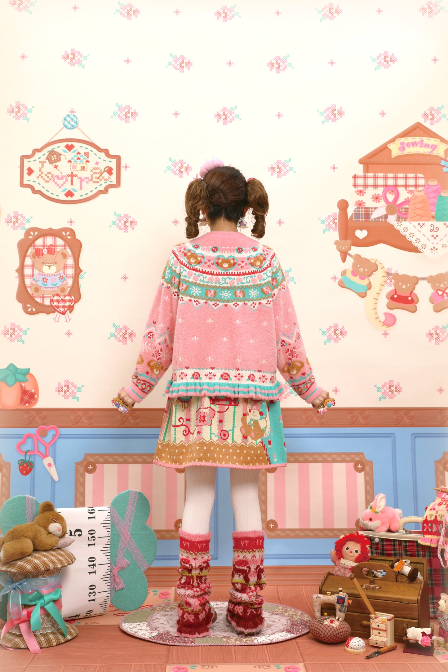 Red and pink Fair Isle style faux mink fur knitted cardigan with rabbit motif