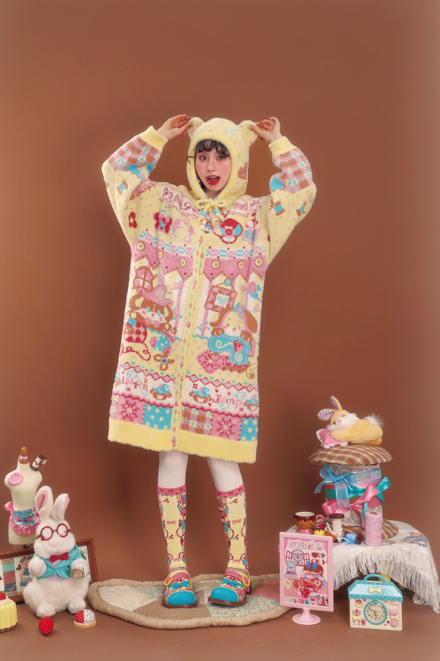 Yellow faux mink hooded cardigan with bear ears and rabbit design, long length, for warmth.