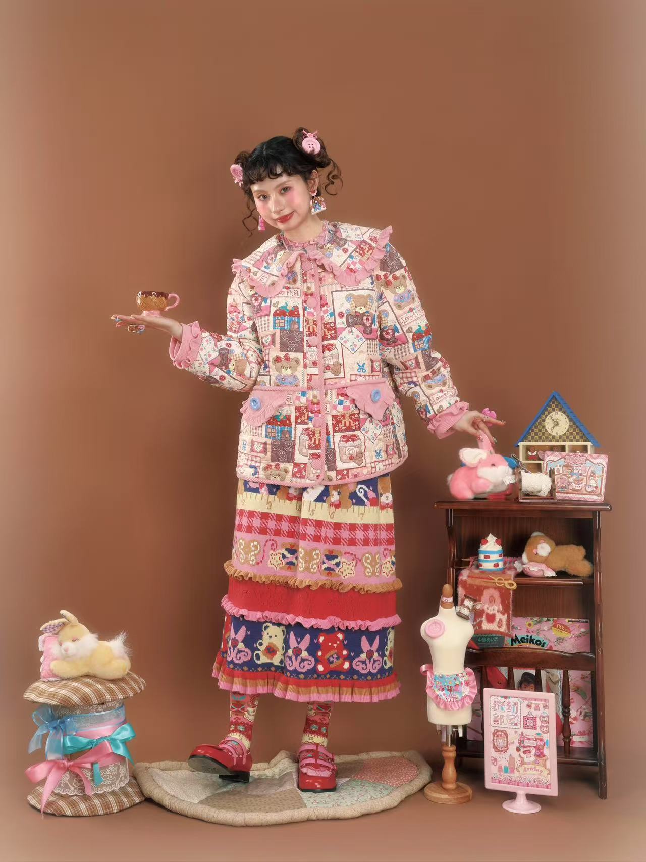 Pink patchwork-style printed loose-fitting warm quilted cotton jacket.
